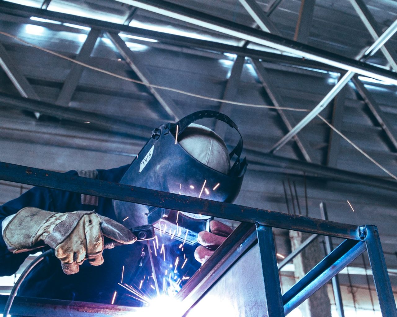 Welder working on a steel structure